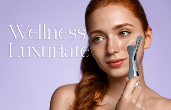 redhead girl on lavender background using a stainless steel facial beauty tool for wellness